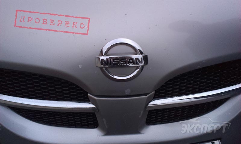 Капот в сколах Nissan Almera