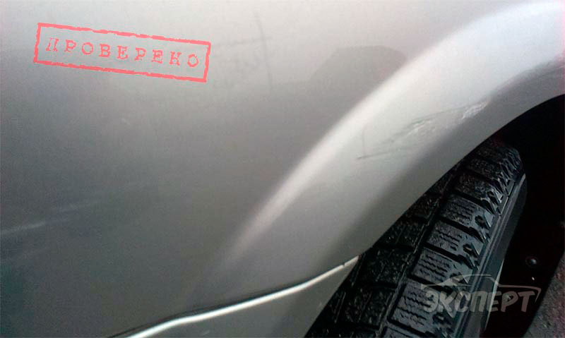Царапина на крыле Nissan Almera