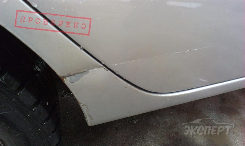 Большая царапина на двери и крыле Mitsubishi Lancer IX